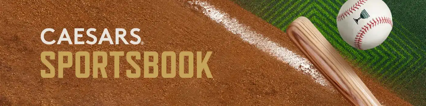 Promotional image for MLB betting on Caesars Sportsbook in Kansas, showing a wooden baseball bat and baseball resting on the infield dirt next to the foul line.